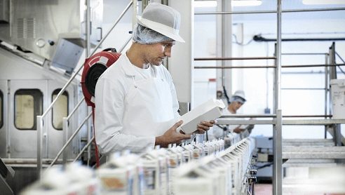 Worker looking at box in lab