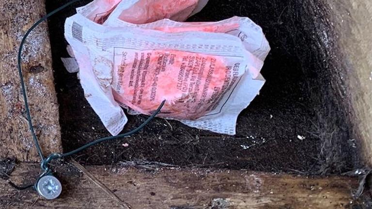 Talon Glow sachets secured with wire into wooden bait box